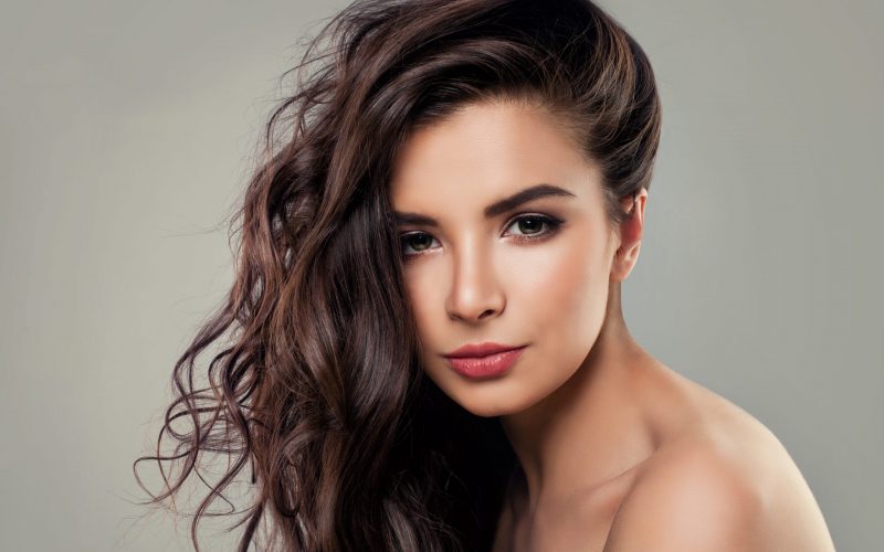 Portrait of Sensual Woman Fashion Model with Natural Wavy Hair Model with Natural Wavy Hair